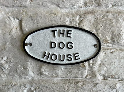 The dog house plaque